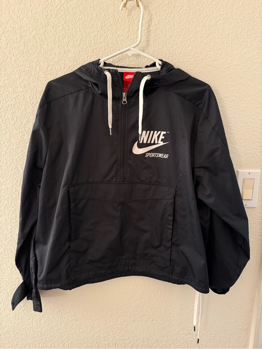 Women’s Nike Jacket - Likely Windbreaker or Lightweight